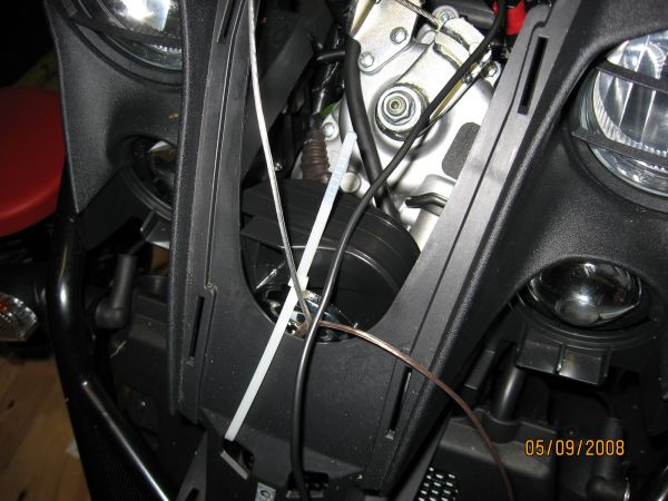 The horn is in there sideways, compressor is on the bottom.