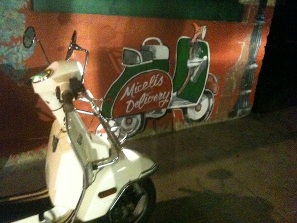 On the other side of the building.