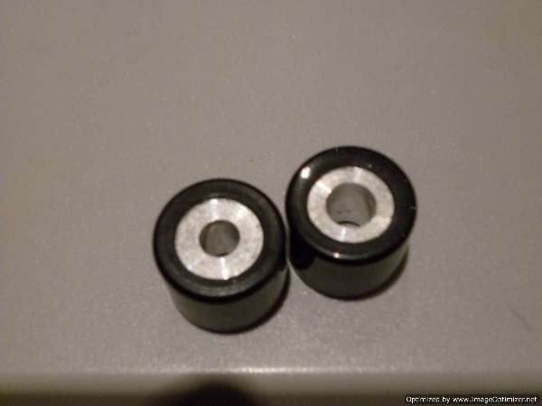Drilled a small amount of metal out of each one at the centre hole. Original on the left 6.5g, drilled out slightly to 6.0g approx on the right of the picture.
