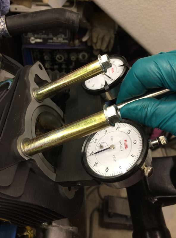 With a .8 and .6 mm base gasket, I'm at .062" below deck.  The factory tool isn't required to get an accurate measurement.  Instead, I'm using a vertical mill tramming tool.