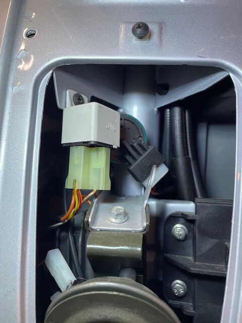 Is the white box a relay and is it involved with the headlights??