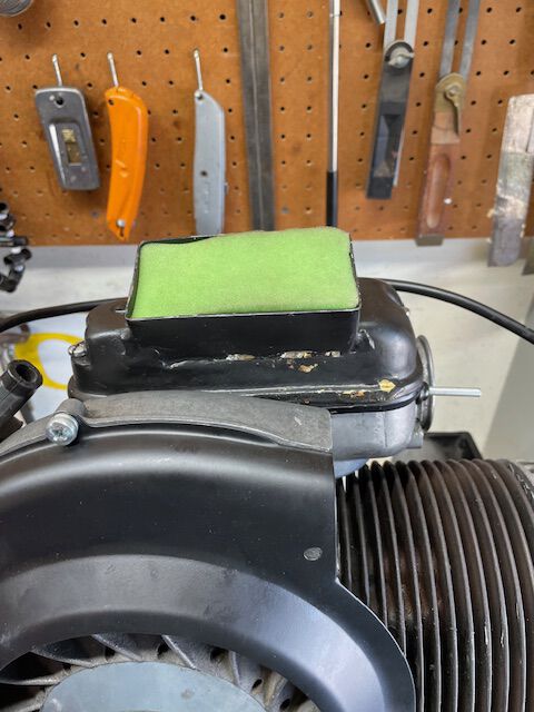 Weird carb box modified to accept Vortex Carb.