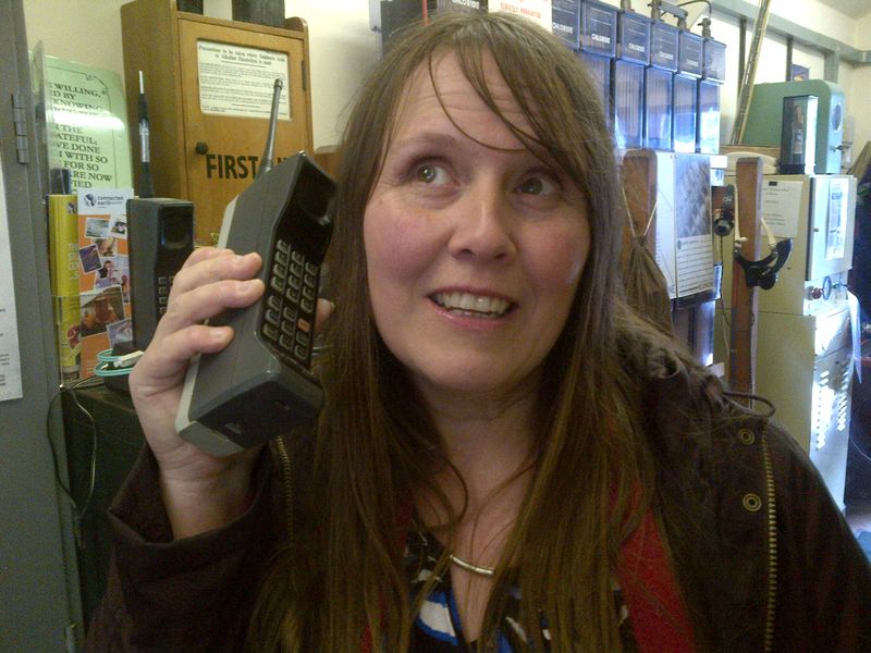 Mrs Fleece sorting out Snoopy's onward travel using Delboy's yuppie phone!