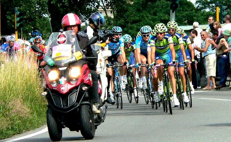 behind the leader
