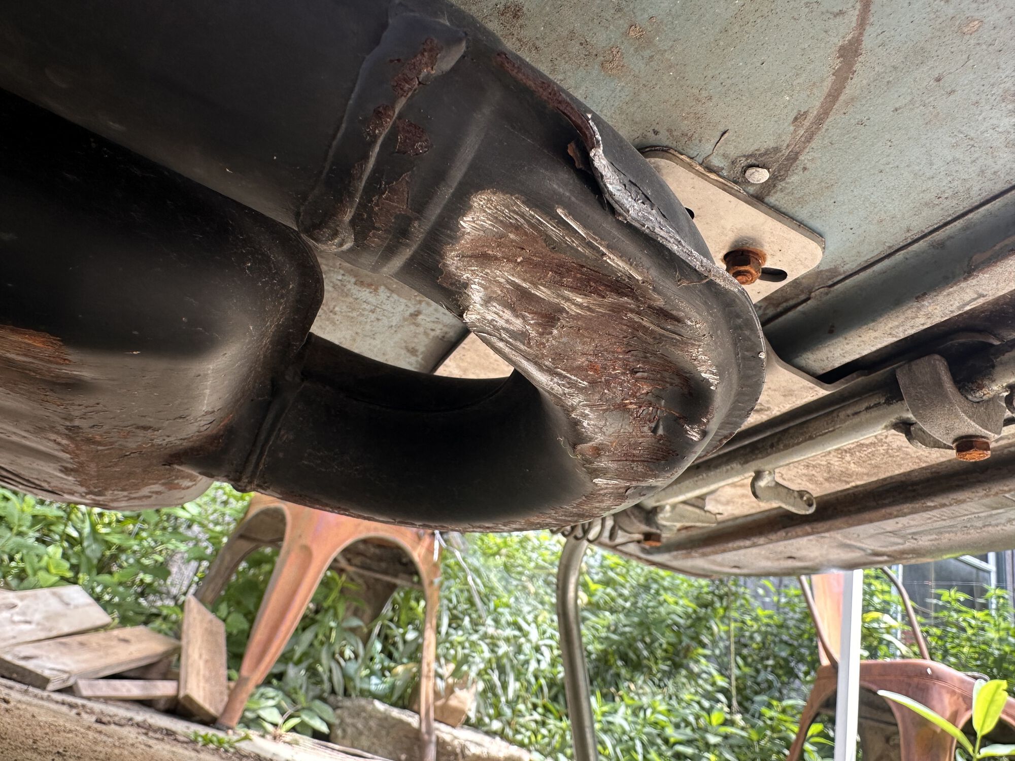 Just noticed while I was fiddling with the carb. Hit the end of my driveway bump it seems a few times.