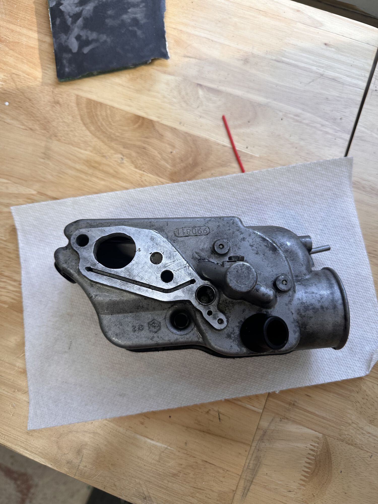 Punched the little collar just below the surface to lap the bottom of the carb box.
