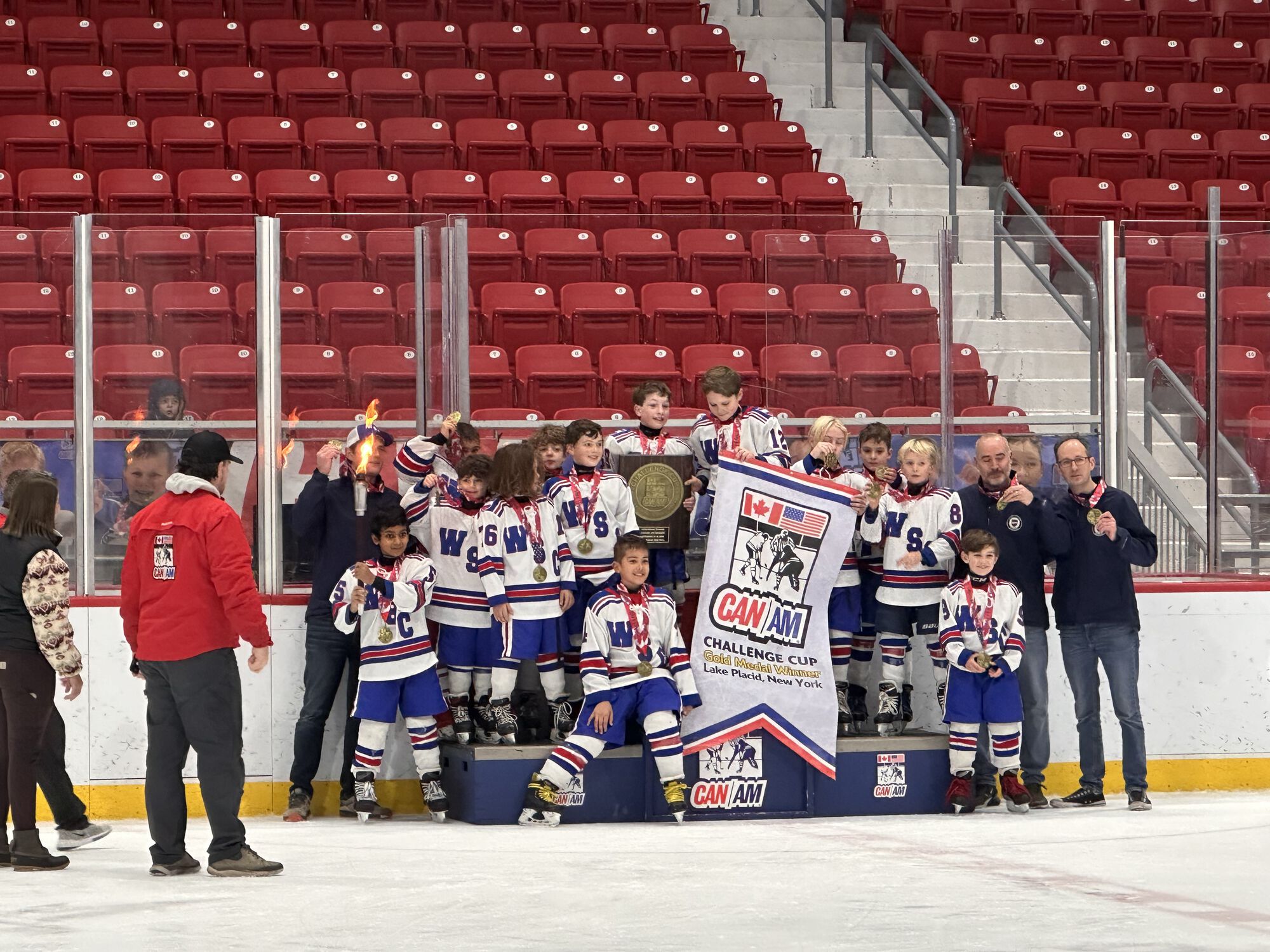 My dude is holding the championship plaque.