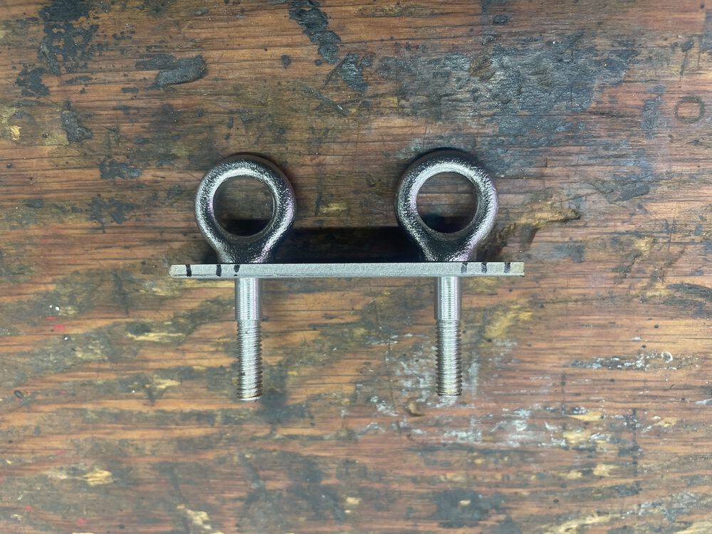 Bolts sit flush, as it will sit against the floorboard