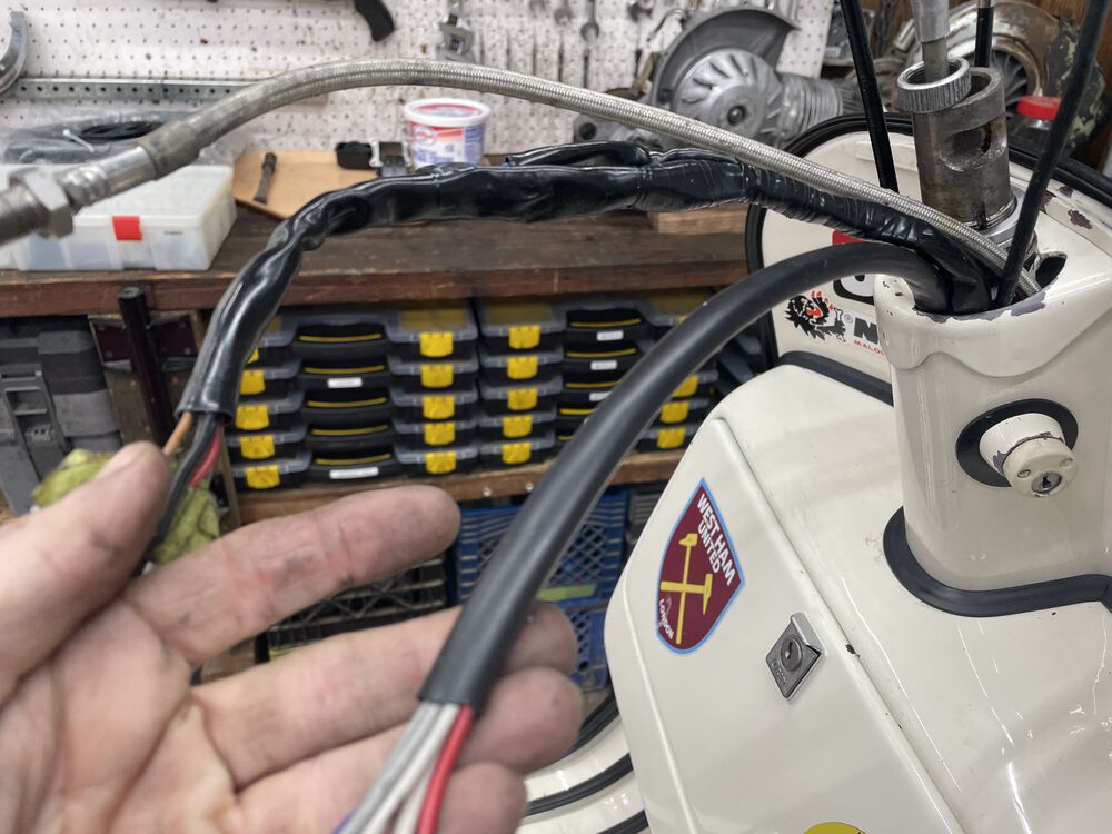 Pulled both harness's back up thru the column in the proper position. One sheathing has been repalced, one was in good shape so I left that intact.