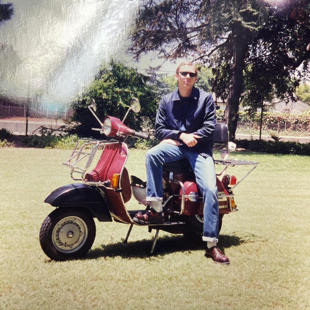 This dude is sharp IMHO. Living that scooterist life 1998.  This photo was captured on film and printed in an actual photography lab using chemicals and stuff. Not cuz its cool (it is), but because thats how it was done in the oledayz...I'm older now