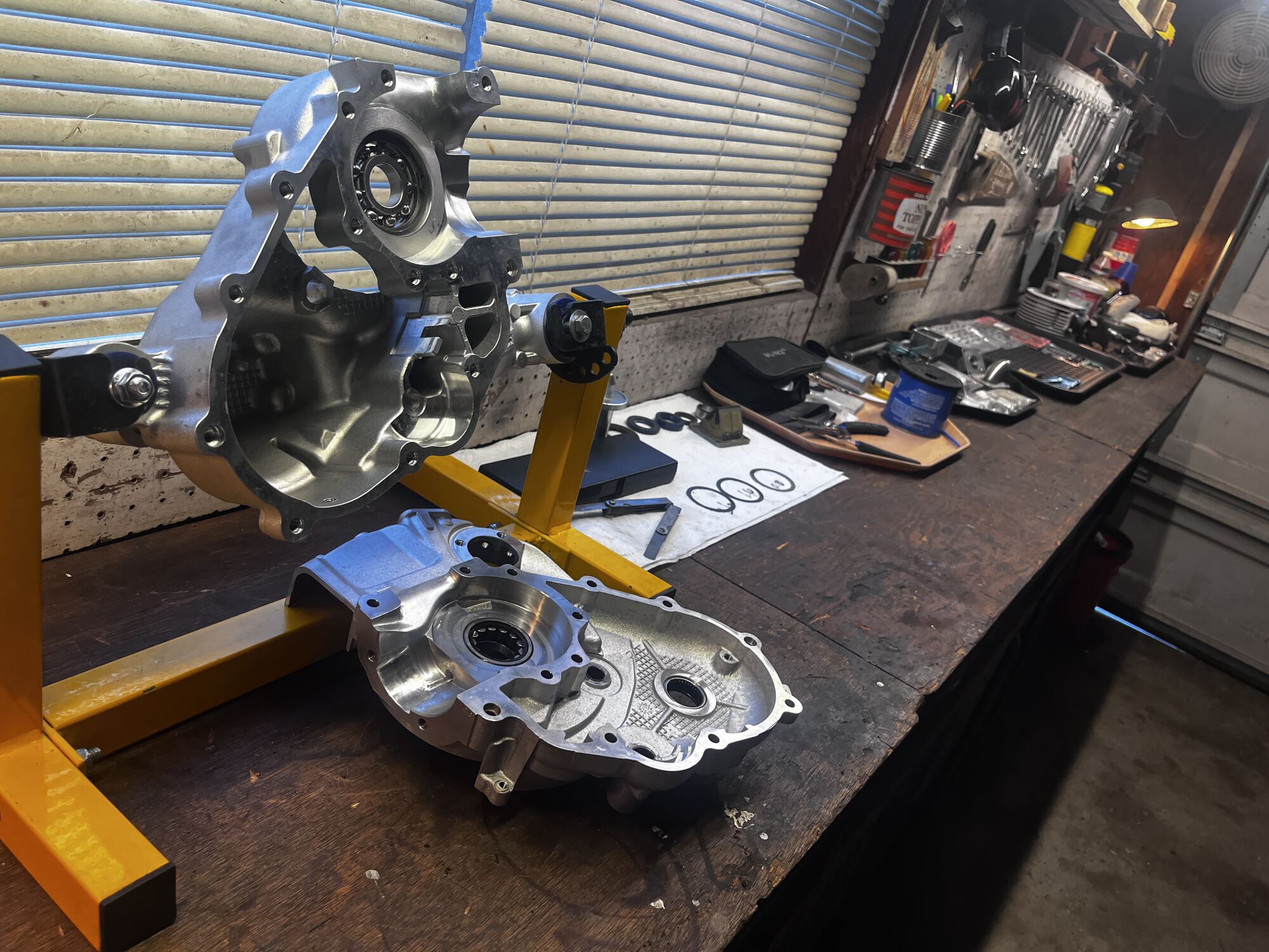 Bearings and Bushings in, engine on the stand, parts sorted and laid out. Can we build it? YES! WE! CAN!