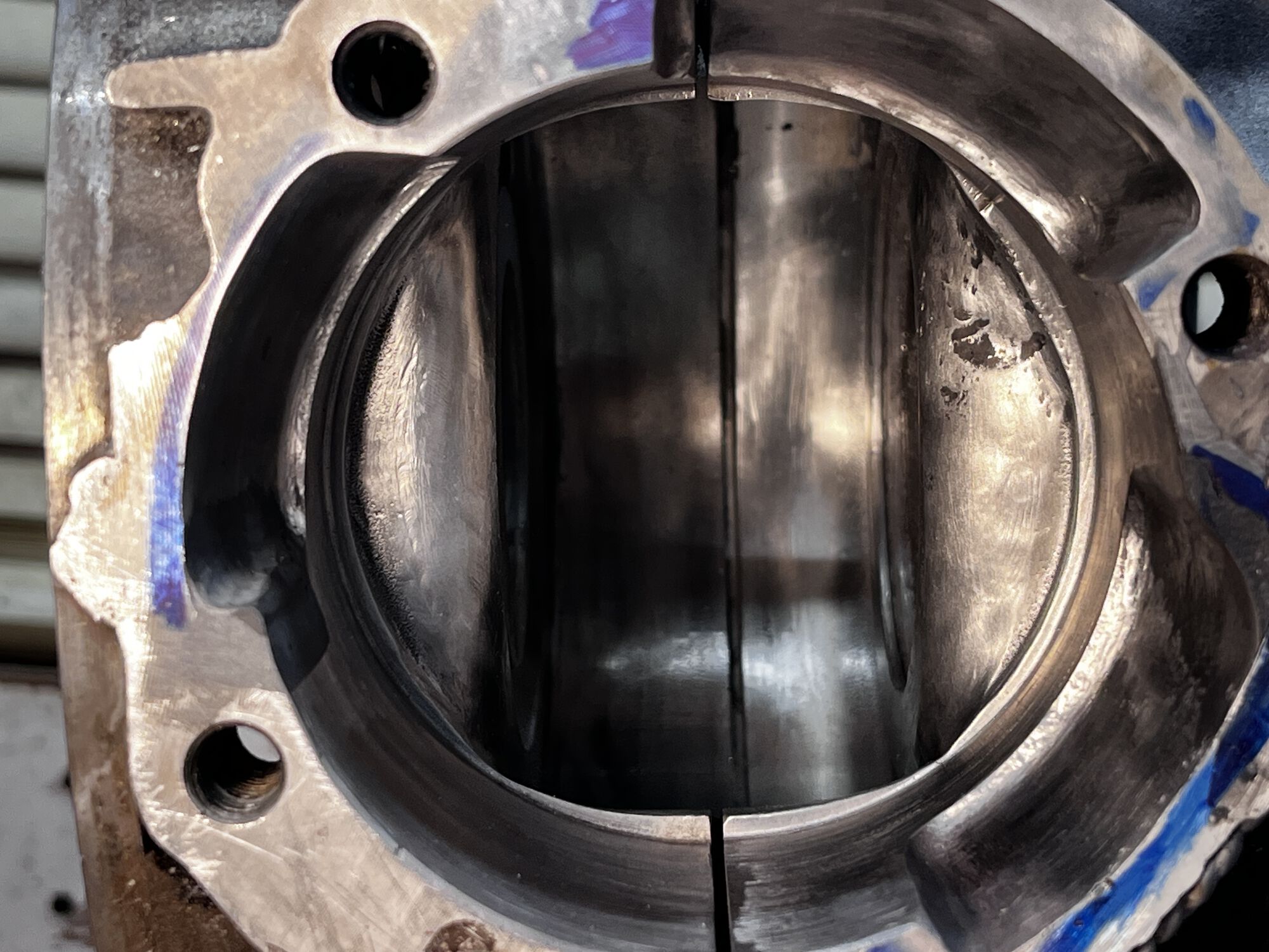 Forward edge of crank housing radiused and flowed. I had the auto lube gear pin welded closed, to be able to smooth this out. Small amount of JB to fill surface pores, not break thru. Mostly for my OCD.