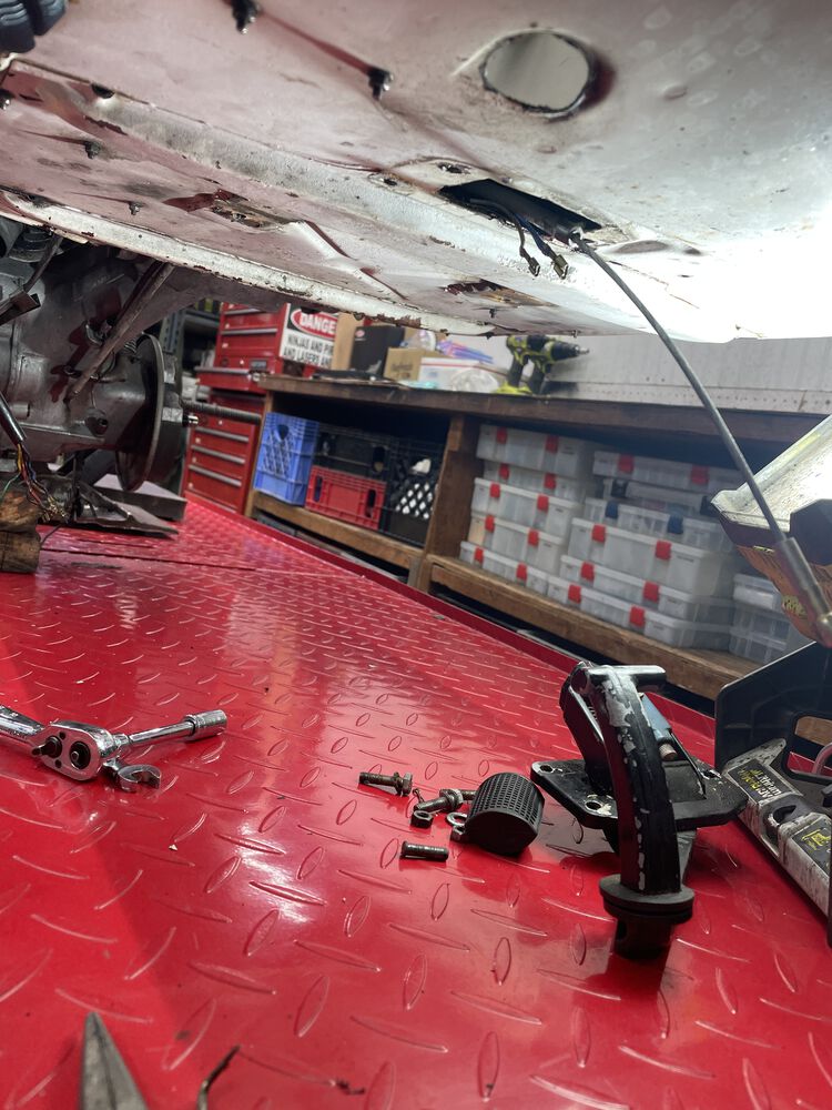 Under is side just a bit grimey, not too terrible. Rear brake pedal removed to replace cable and allow access to clean inside tunnel.