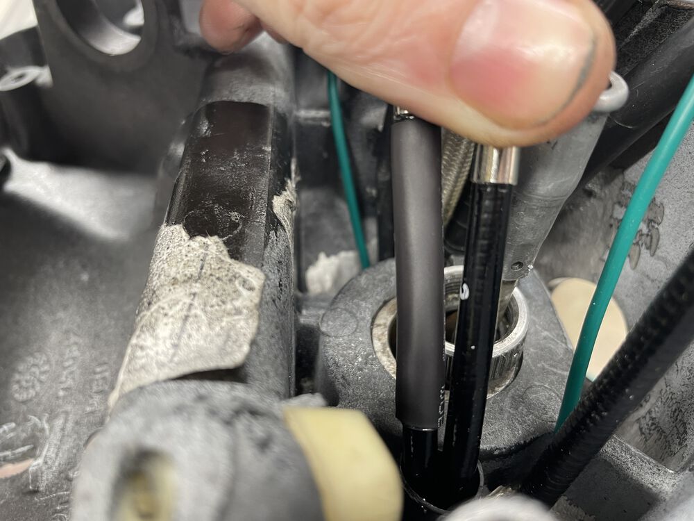 I added marine grade heat shrink tubing over the cable outers, in areas of friction and wear; to help prevent tearing thru the outers over time.
