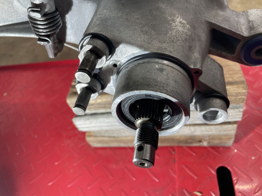 New O-rings, grease packed seal. The rear drive bearing is sealed, so the grease is just to lube the seal for extra precaution.