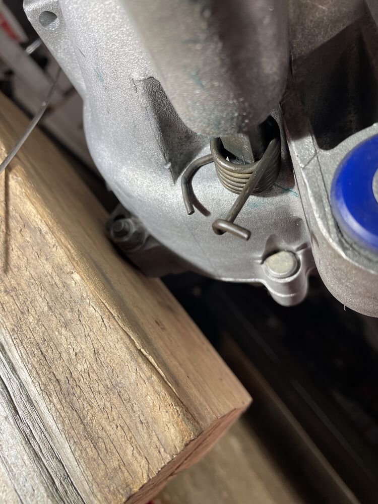 I added a bend to the lower leg of this return spring. To allow the spring to better fit the shape of the engine case.