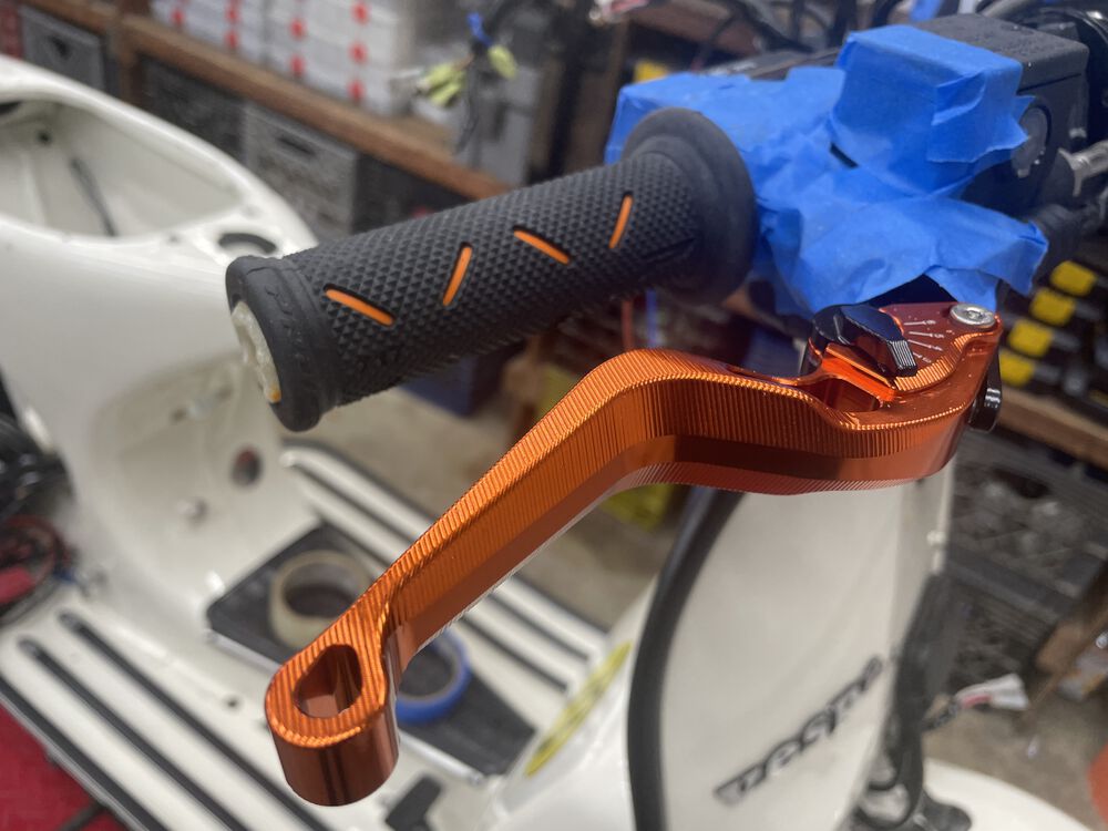 Grips on and sitting tight! I chose ProGrip dual density. Open ended grips, as I'll be using bar end lights. Again, we all know orange is the fastest color.