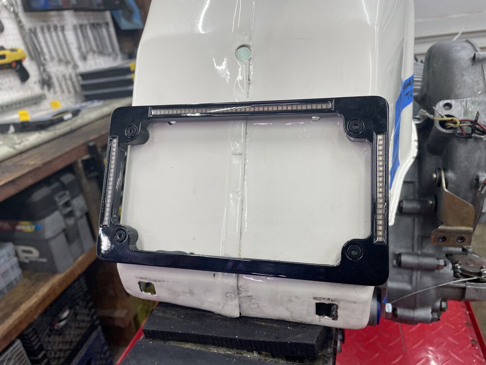Fits great, just above the rear bumper. 4 thick rubber washers between led frame and body.