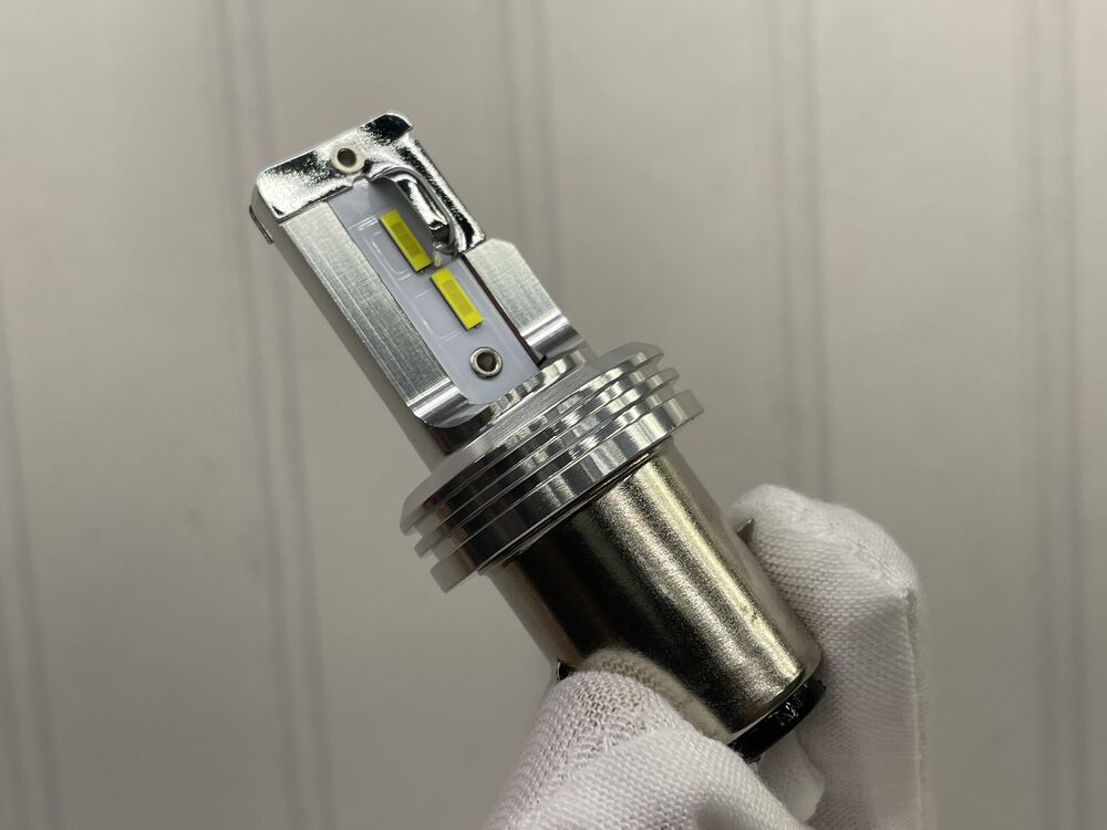 Description says it works AC or DC, and with same light pattern as an halogen h4; only brighter. We will see. See what I did there.