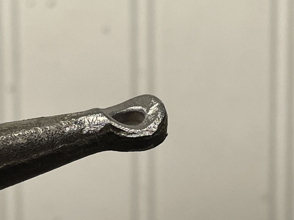 A bit of work on the cable arm.  I smoothed everything out, and rounded the pivot area for the cable clamp.