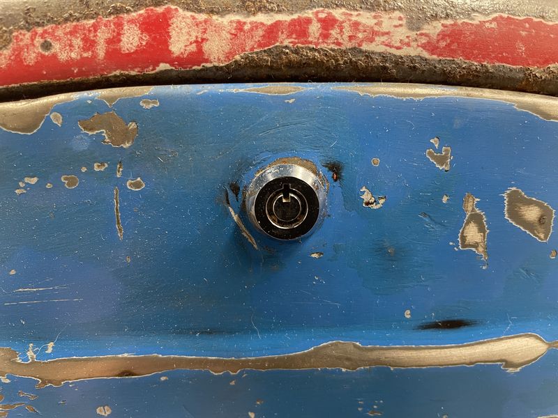 Slightly larger than the original latch. Mounting hole must be enlarged.  Available with a regular key, or this security key. This lock is smaller than the ones sold by the scooter shops.