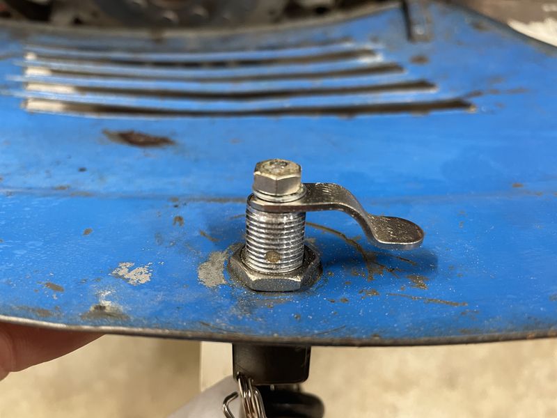 I bent the latch so that it would engage the original detent in the frame. It was a little tricky to get it just right, thankfully the lock came with a spare latch plate ;)