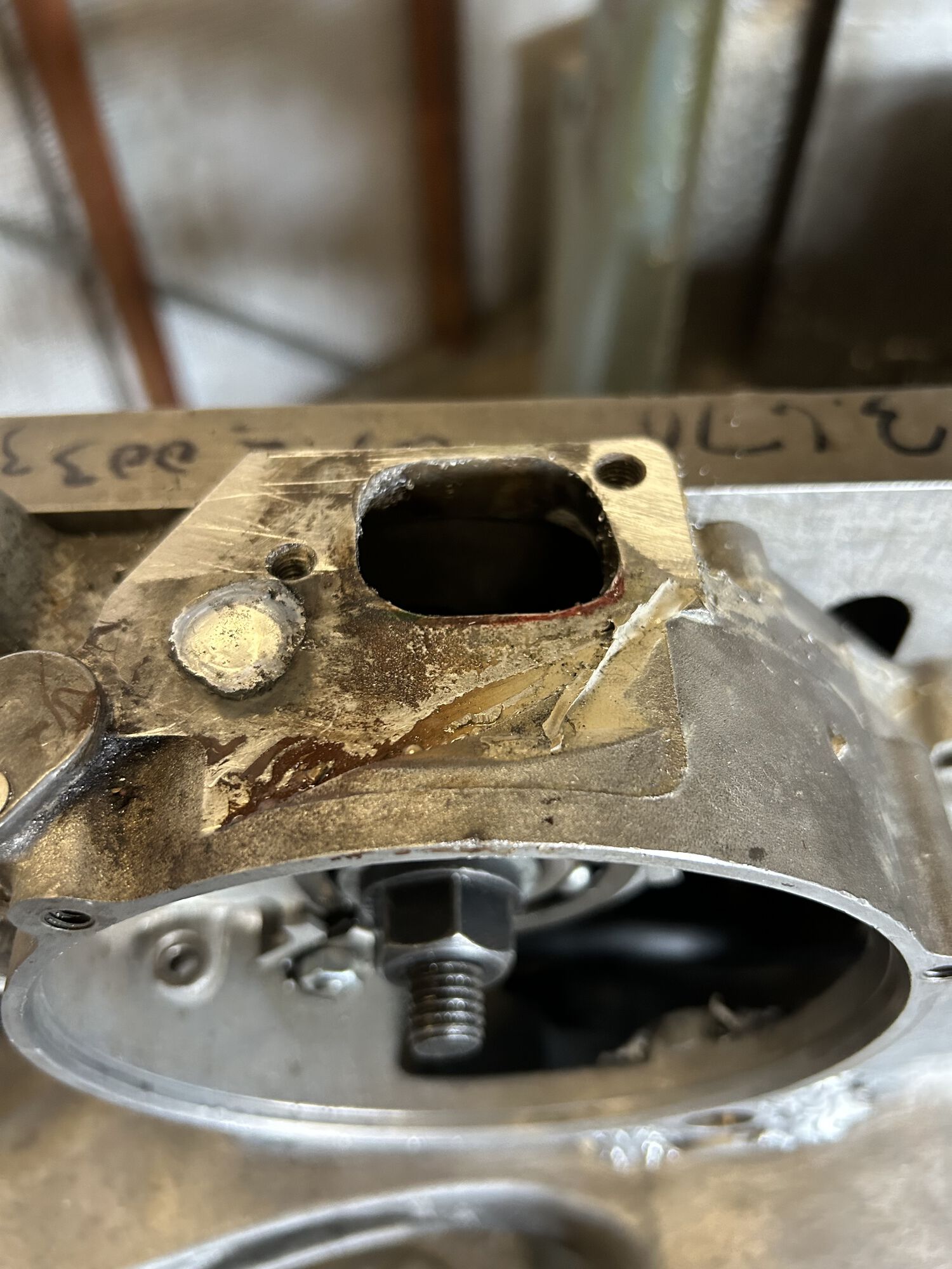 carb stud hole welded, ready for machining.