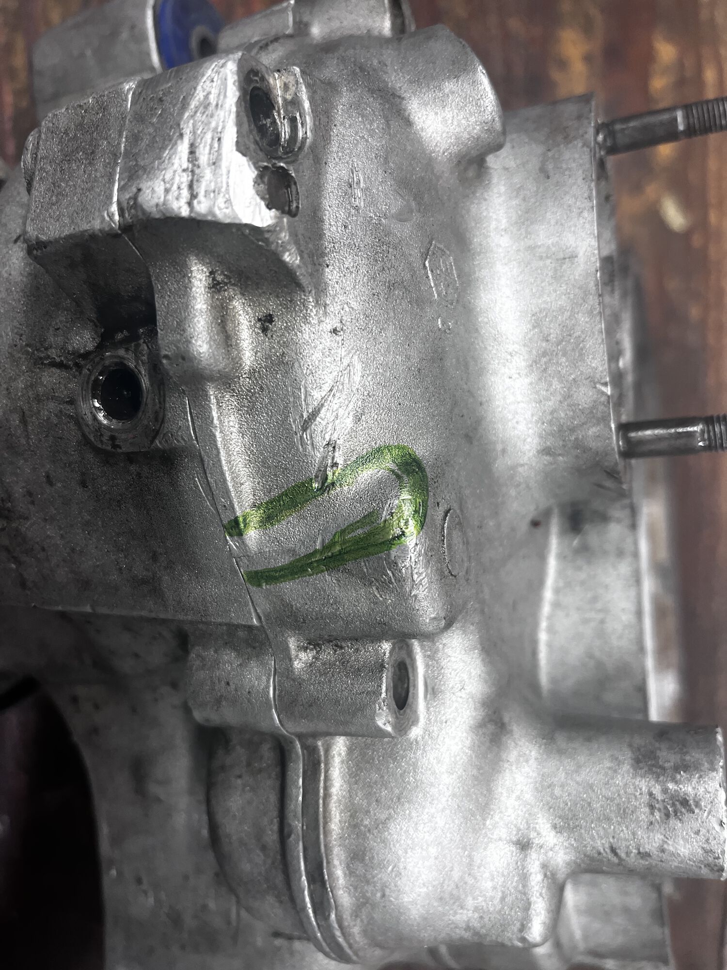crack extends in the green area. Hard to see exactly the end….