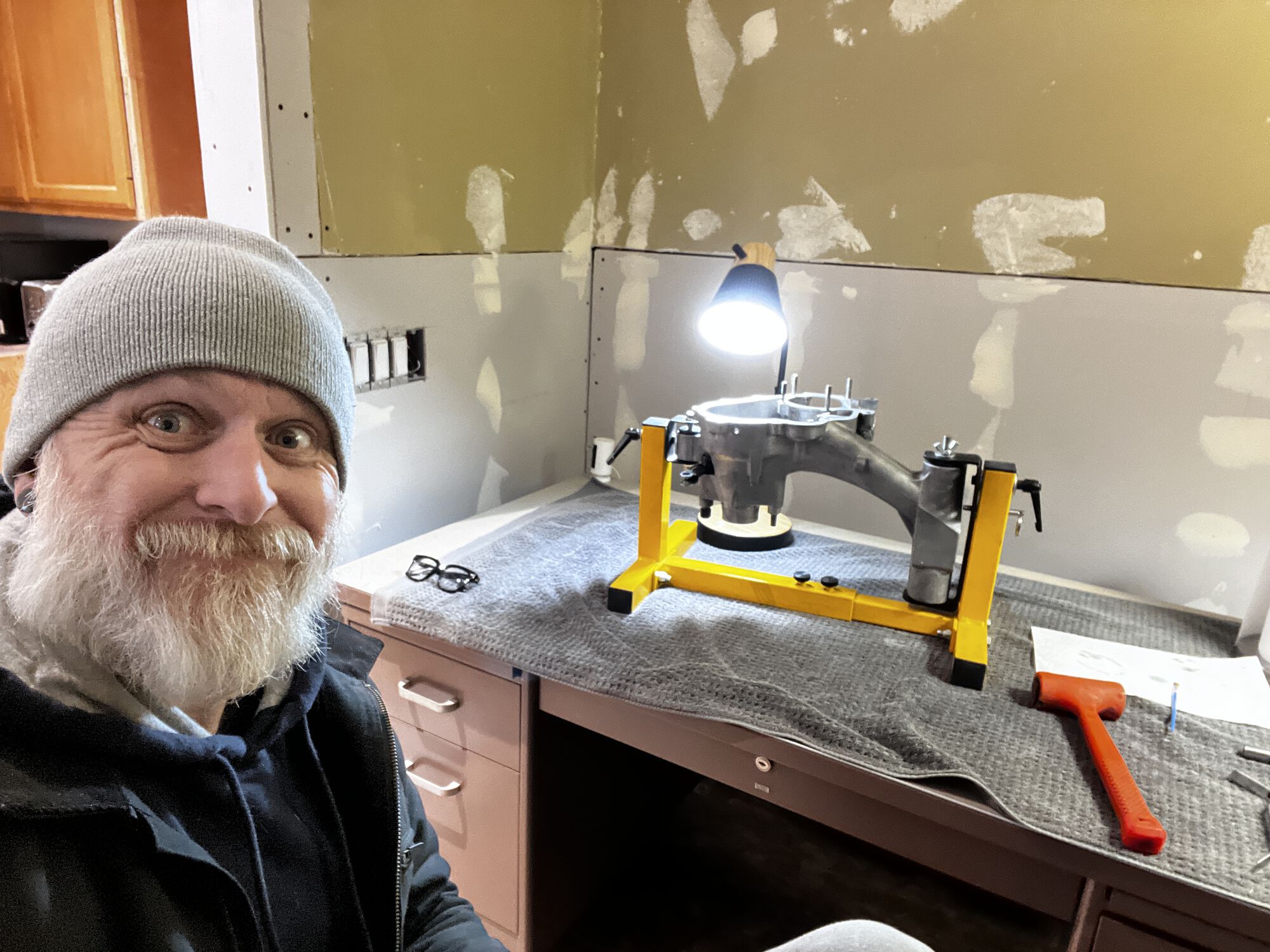 Geeklion in a groove. Thankfully this room is already under construction, so I might as well construct a Vespa engine in here as well