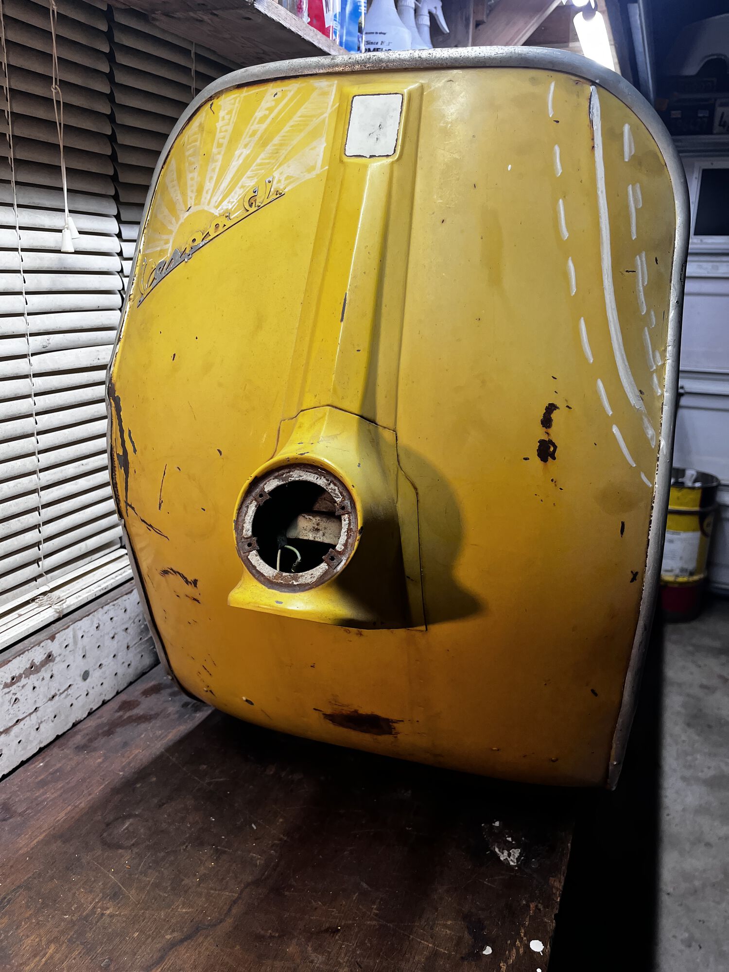 View of the front. Chalk marker used to highlight the biggest dented/creased area on left side. And for doodling!