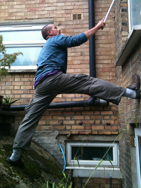 note the 'rustic' pointing on the brickwork below his right leg