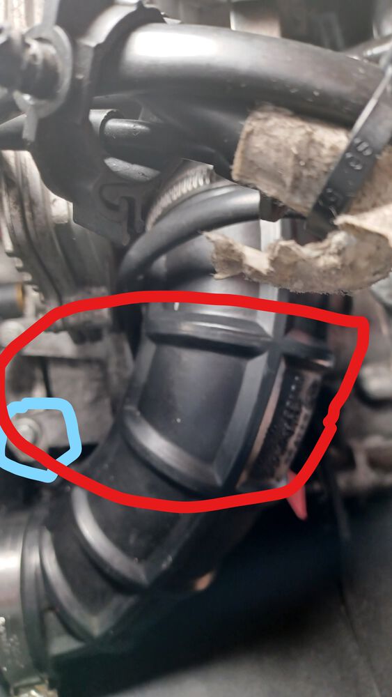 The only ground I re-attached when putting the engine back in is blue, the red area under the hose - is that the starter?  If so, I don't see a positive line?