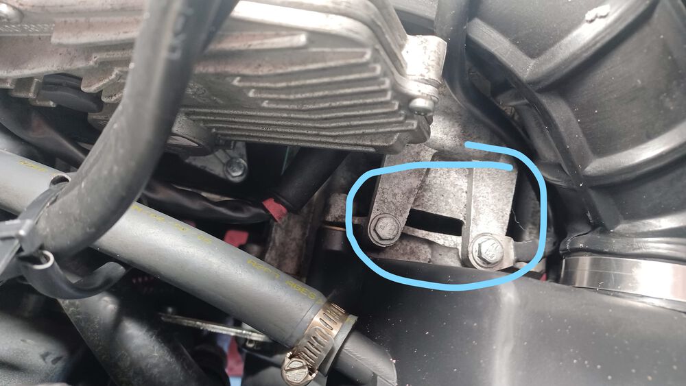 left side starter motor, with negative ground attached.