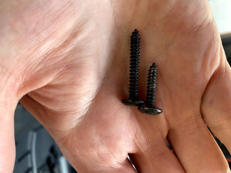 Take out short screw put longer screw in with a little spacer