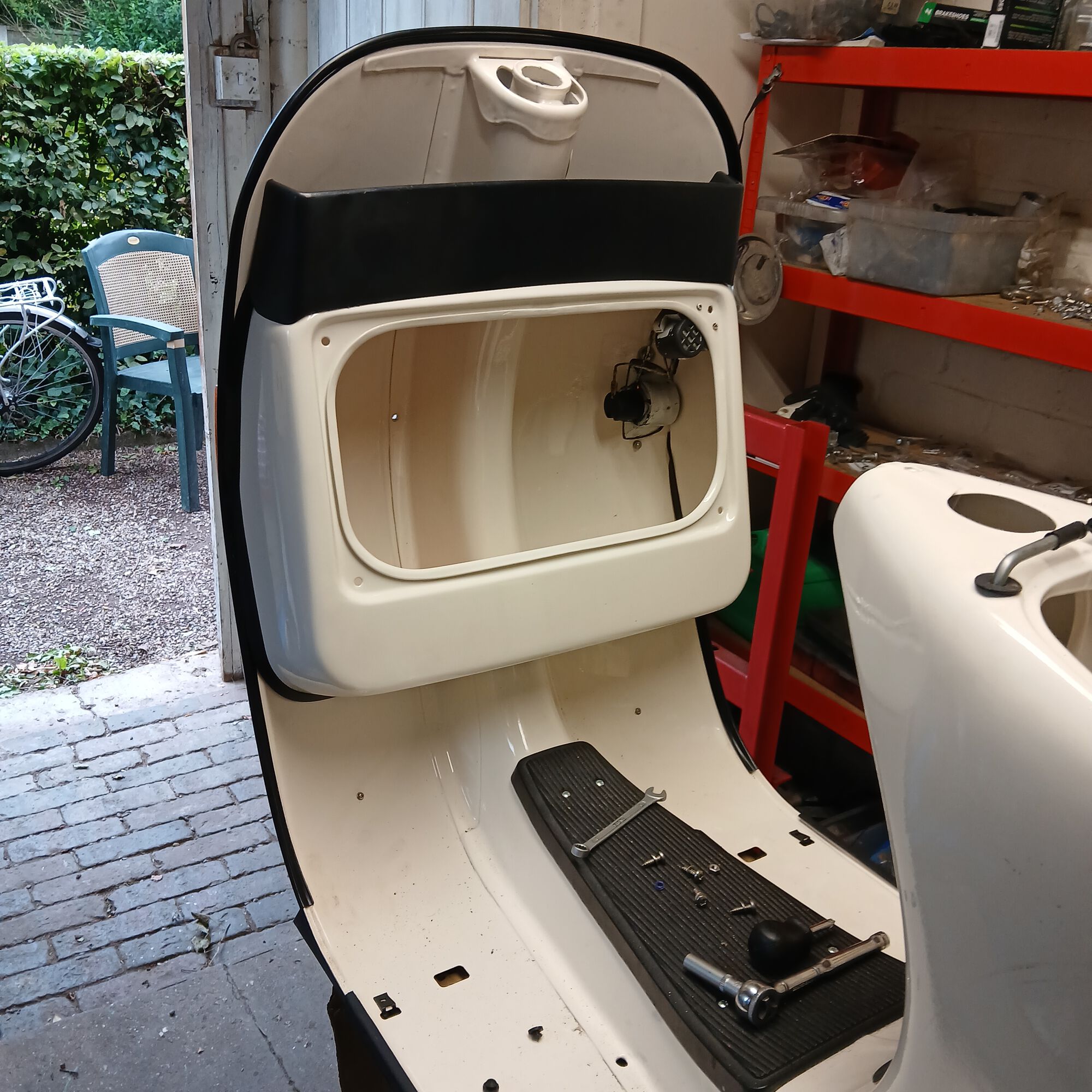 Original toolbox tray after running over with a scotchpad and some metal polish