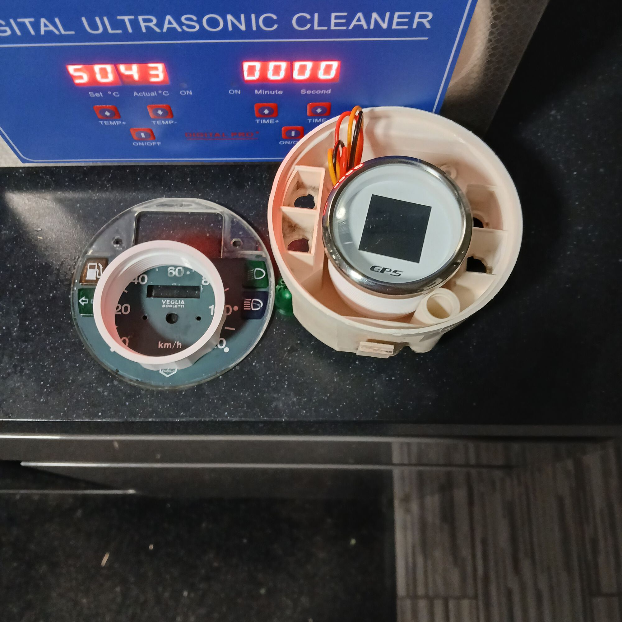 Should fit with some small amount of material removed from the speedo housing