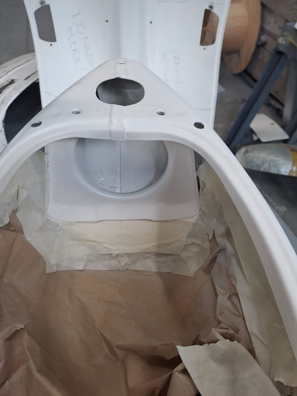 Tank area showing filled extra hole