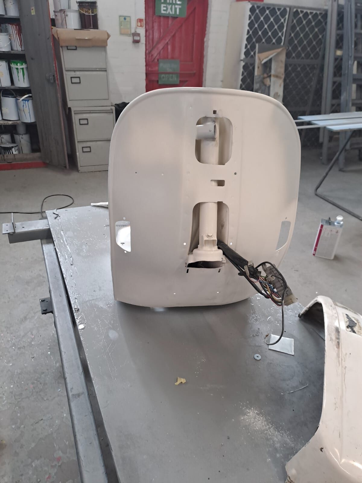 Front leg shield, shaped and filled
