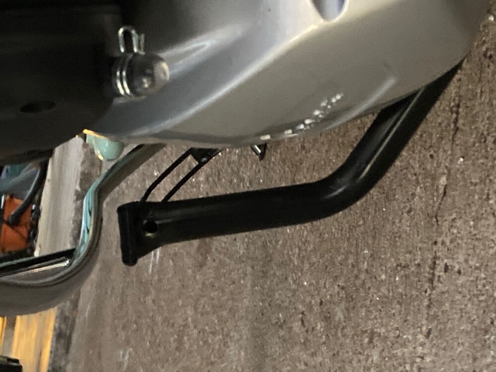 No room to put my foot on the centerstand arm.