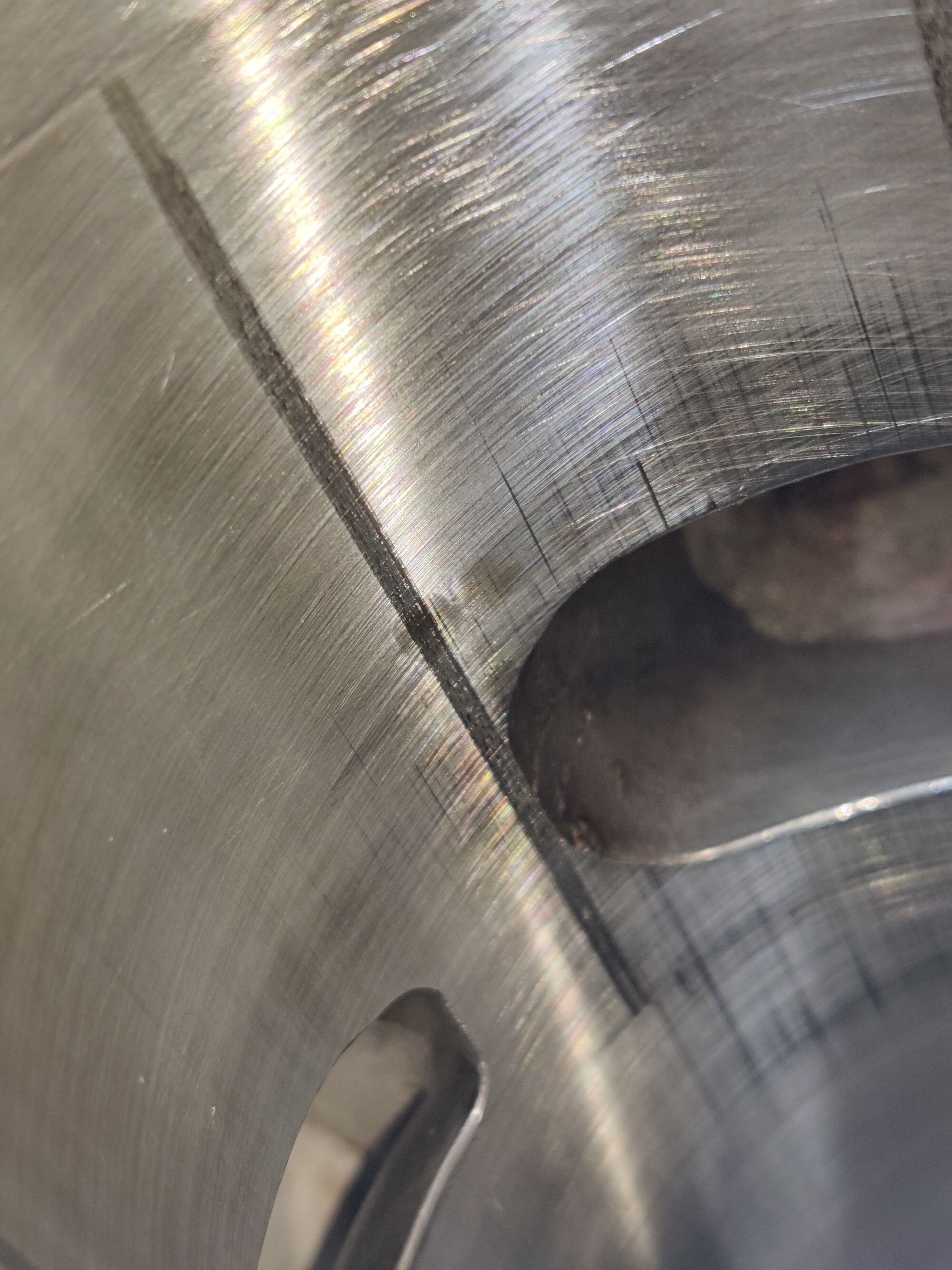 Smaller line on the other side of the exhaust port.