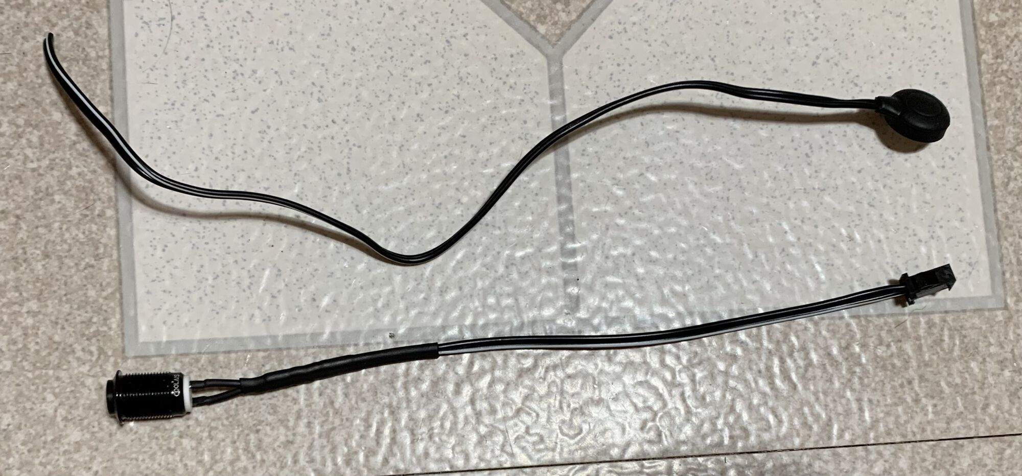 New button switch wiring harness made by cutting off plug connector from SIP button switch and soldering it to new switch wiring.