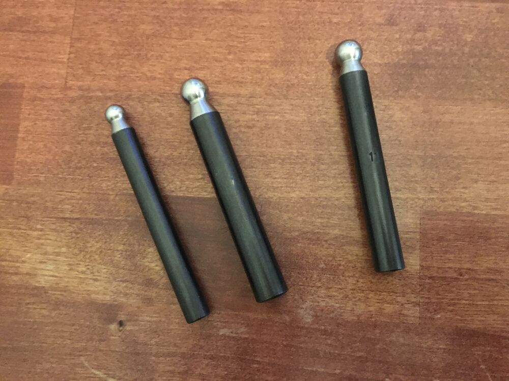 Jewelry punches to get the shape for the tail corners.