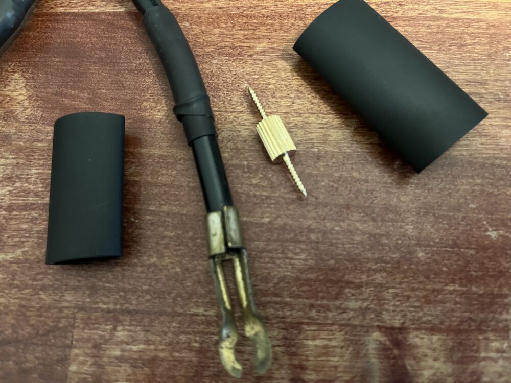 This thing arrived. It comes with two huge pieces of heat shrink. I think I'll use some thinner gauge stuff. As subtle as possible.