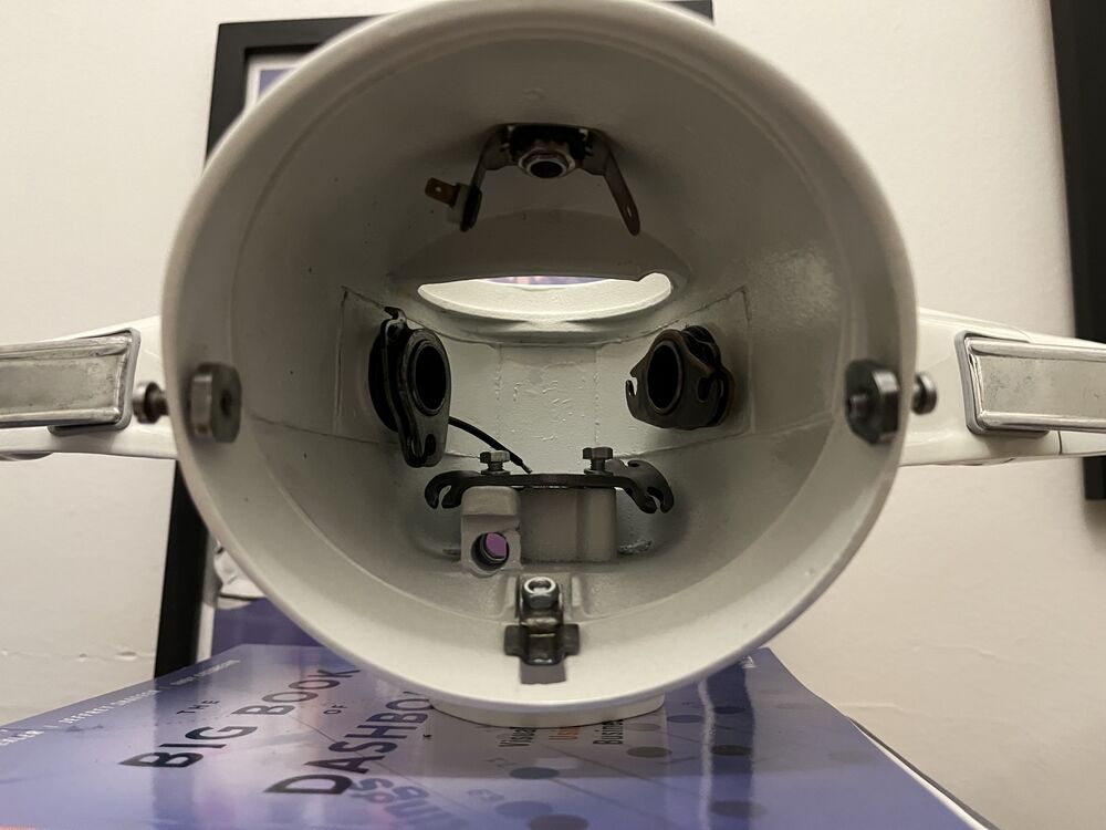 Might be possible to put it here. There's a tab that stops the throttle on the inside. If it would fit in the space between the headset and cable.