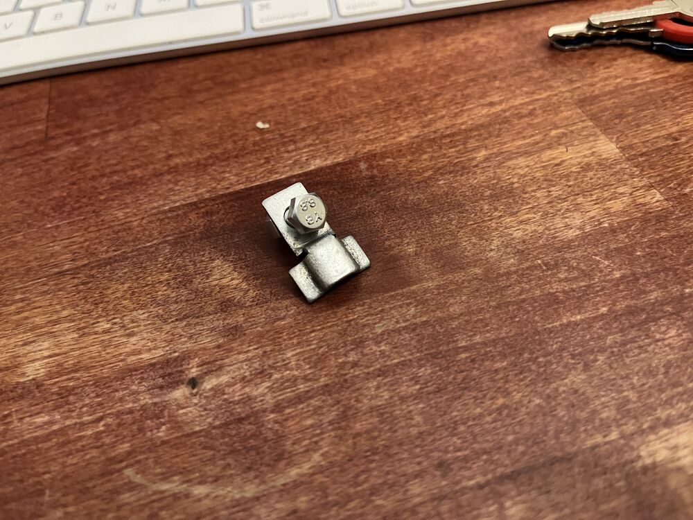 This is the bottom headlight attachment. No clue how it works.