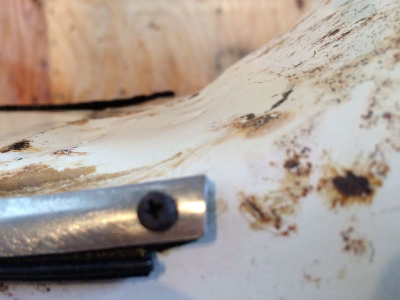 Modern Vespa : Rally with rusted frame channel.