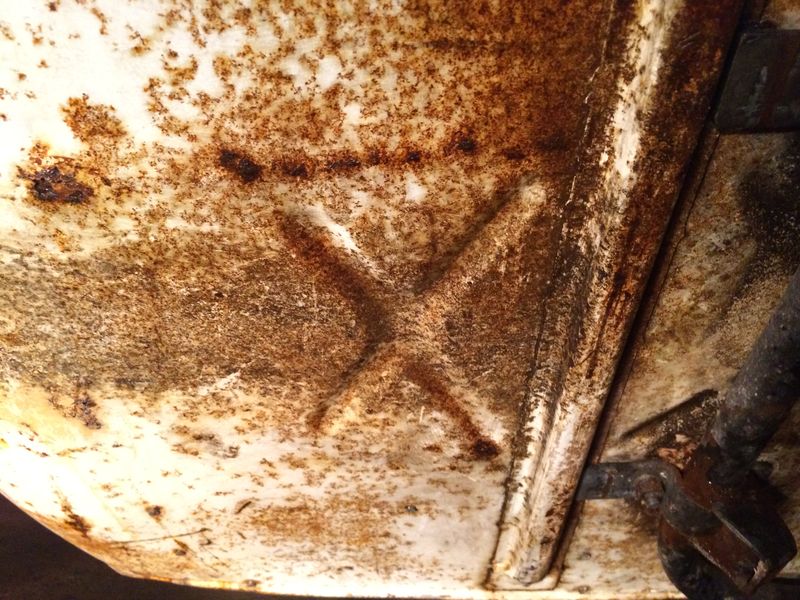 Modern Vespa : Rally with rusted frame channel.