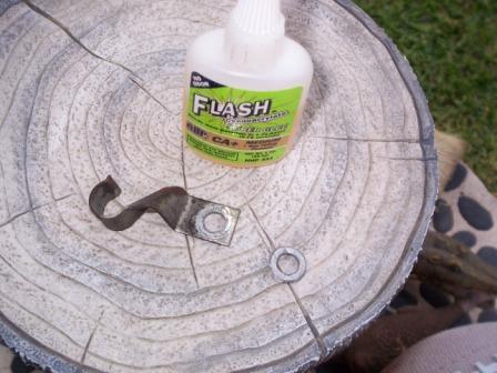 I used super glue to attach the lock washers to the upper mounting bracket.