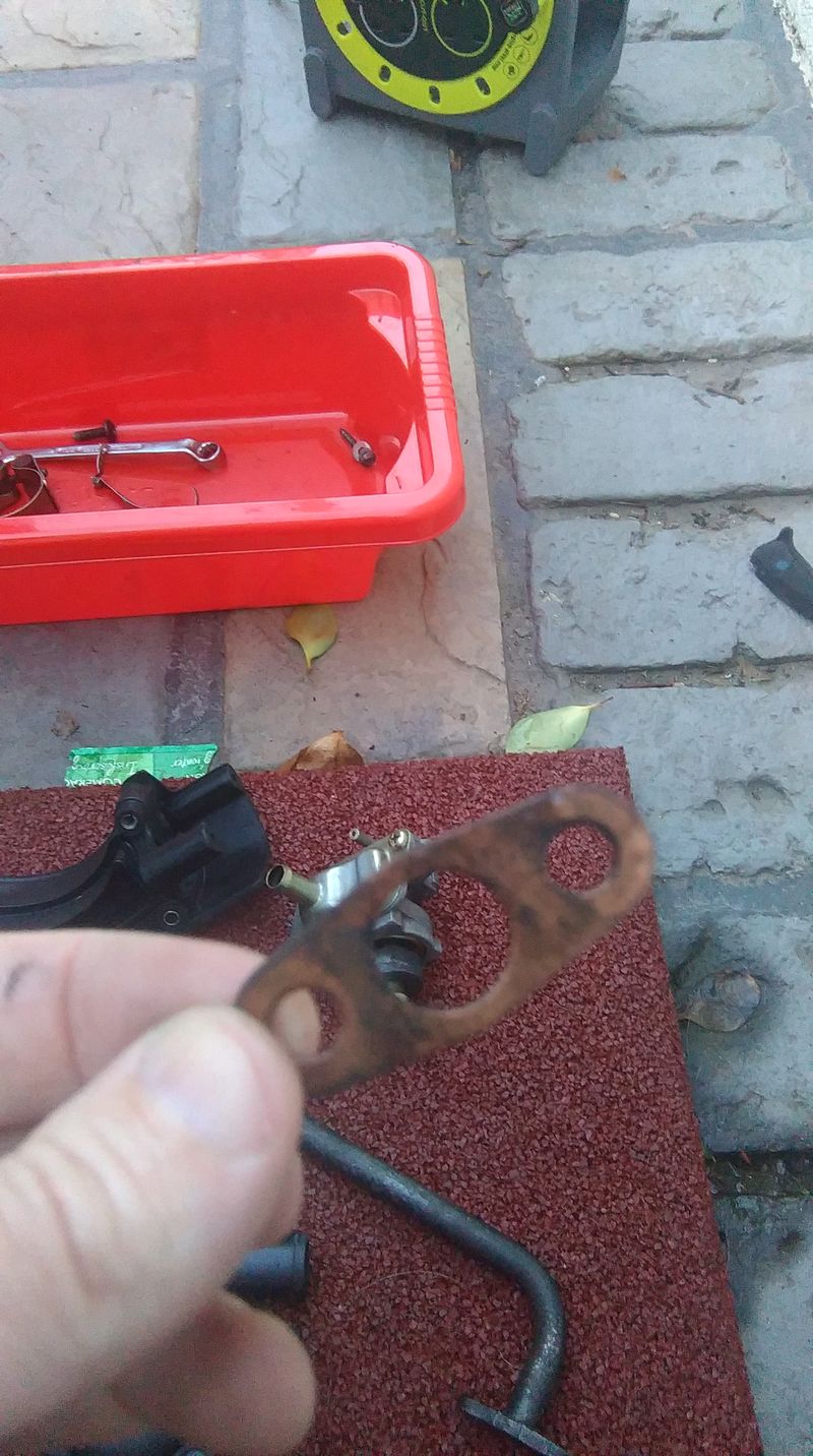 Don't forget the copper gasket when you are replacing the hard pipe back on to the cylinder head !