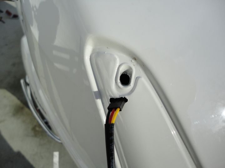 I didn't have a 9/32 drill-bit handy, so made a slot using a smaller drill big enough for the connector.